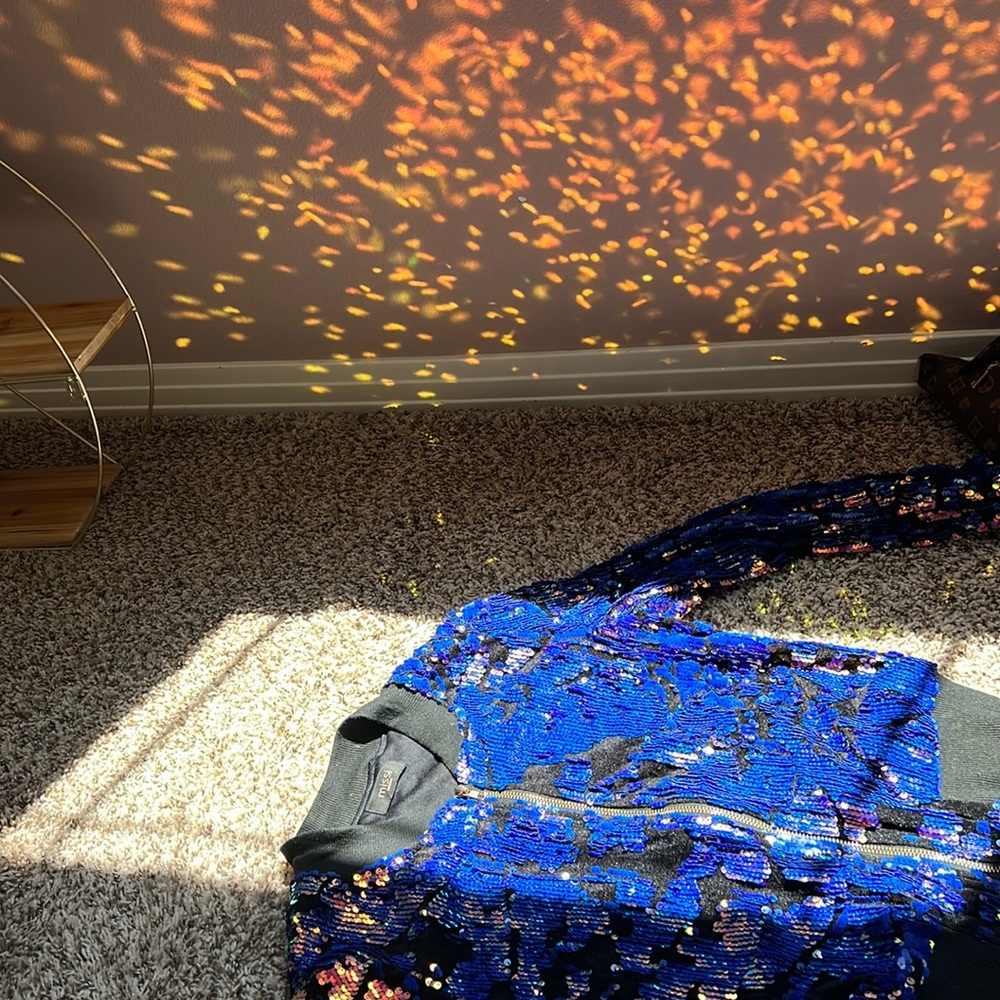 Sequin jacket. Like new, suuuuper sparkly. Great for a night out: lightweight.